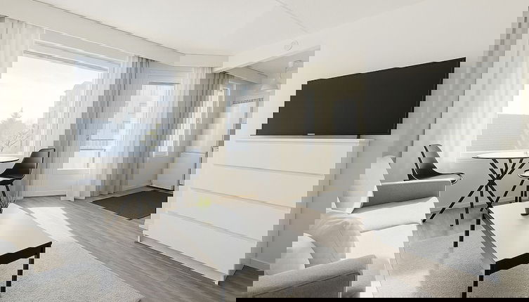 Foto 1 - TH City Suite 1