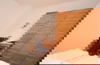 Photo 3 - Apartment With a High Chair and bed