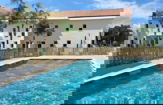 Foto 1 - Nice Apartment With Shared Pool