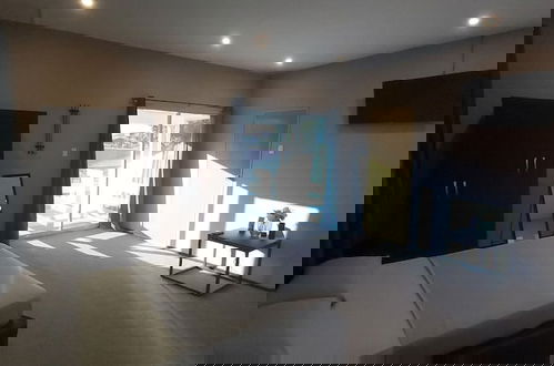 Foto 11 - Waterland Suites