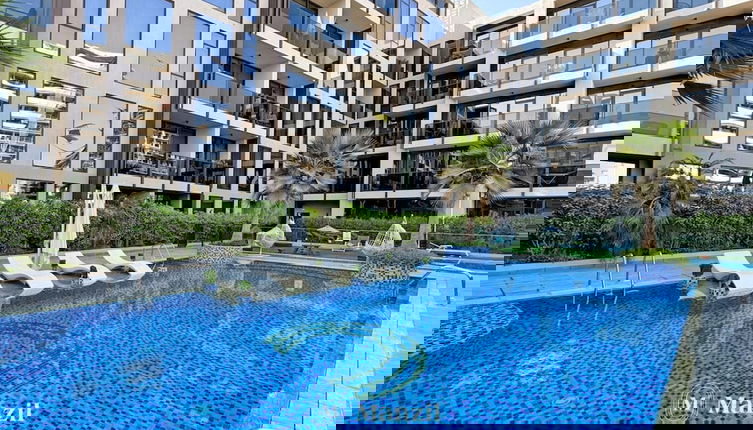 Foto 1 - Stylish 1BR Apt w Pool in JVC nr Dubai Sports City