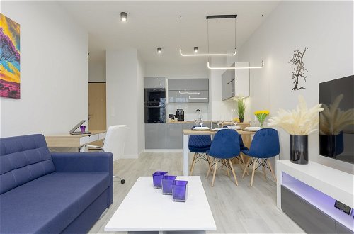 Photo 8 - Dark Blue and Grey Apartment by Renters