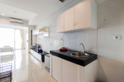 Photo 18 - Nice And Comfy 1Br At Dago Suites Apartment