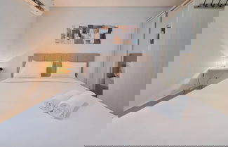 Photo 1 - Comfortable And Homey Studio Room At Barsa City Apartment