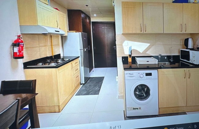 OYO 1233 Home Elite 1 Residence Sports - Foto 2