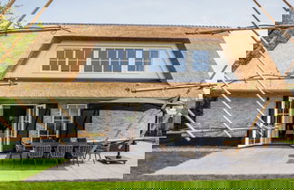 Foto 1 - New Thatched Villa Near the Beach