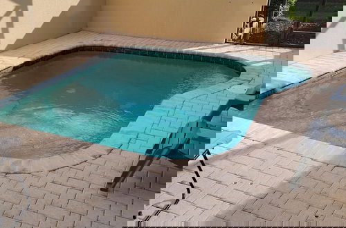 Foto 11 - 3 BR 2 Miles to Disney Pool Free Wifi and More