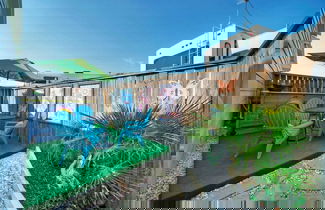 Photo 3 - Shared Resort-style Pool, Playground, Patio w/ Bar Tidal Times by Avantstay