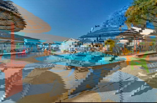 Photo 33 - Shared Resort-style Pool, Playground, Patio w/ Bar Tidal Times by Avantstay