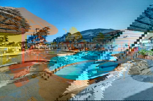 Photo 30 - Shared Resort-style Pool, Playground, Patio w/ Bar Tidal Times by Avantstay