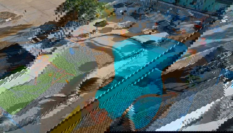 Foto 1 - Shared Resort-style Pool, Playground, Patio w/ Bar Tidal Times by Avantstay