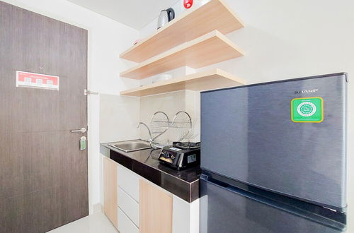 Foto 6 - Fully Furnished And Homey Studio Serpong Garden Apartment