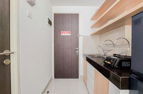 Foto 7 - Fully Furnished And Homey Studio Serpong Garden Apartment