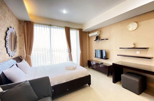 Photo 4 - Warm And Cozy Studio At Dago Suites Apartment