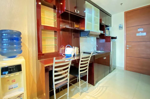 Photo 6 - Warm And Cozy Studio At Dago Suites Apartment