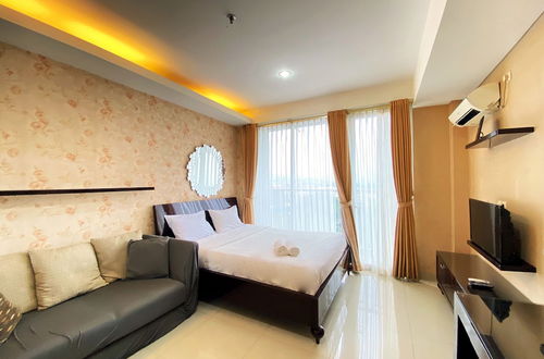 Photo 2 - Warm And Cozy Studio At Dago Suites Apartment