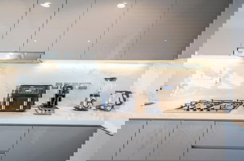 Foto 17 - Elite LUX Holiday Homes - Skyline Oasis One Bedroom Premium Apartment in Al Jaddaf