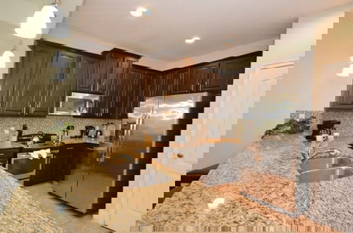 Foto 8 - Tropical Fountains 3 Bedroom Condo by RedAwning