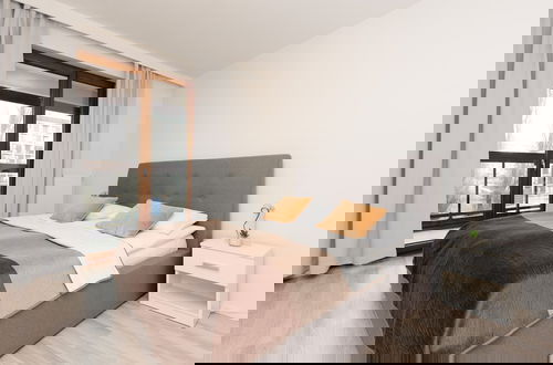 Photo 2 - Roomy Apartment Grzybowska219 by Renters
