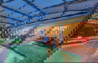 Foto 1 - Disney Decorated Home 8min to Disneyworld Pool Spa Sleeps 22 Stl104