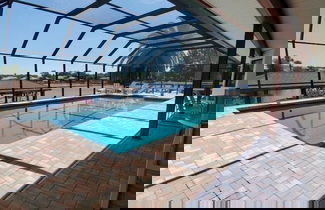 Foto 1 - Dancin Dolphin 3 Bedroom Home by RedAwning