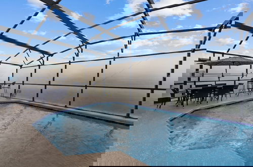 Foto 22 - Vacation Resort Home Right Outside Of Disney World Parks With Private Pool 4 Bedroom Home by RedAwning