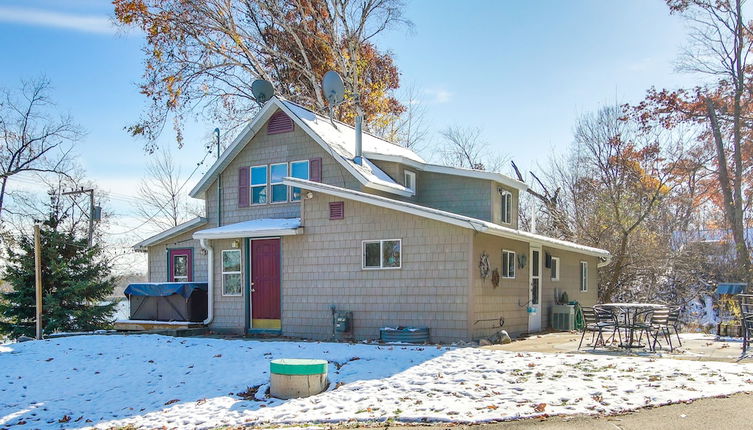 Photo 1 - Colorful Cottage w/ Hot Tub - Steps to Long Lake