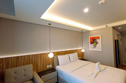 Photo 9 - Cozy Studio Room At Mataram City Apartment