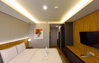 Photo 1 - Cozy Studio Room At Mataram City Apartment