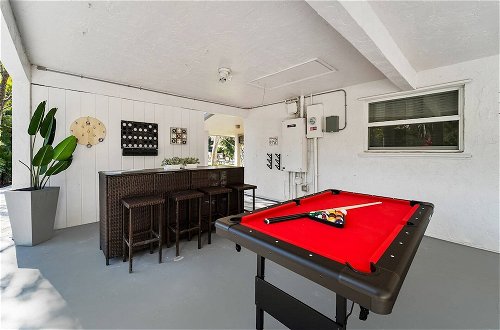 Photo 13 - Spacious 8BR w/ Guesthouse + Pool & Tons of Games