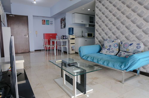 Photo 13 - Homey And Cozy 1Br Apartment At Braga City Walk