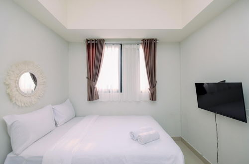 Photo 8 - Simple And Cozy Stay 1Br At Evenciio Margonda Apartment