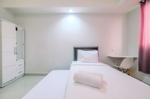 Photo 1 - Nice And Comfortable Studio Evenciio Margonda Apartment