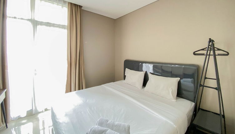 Photo 1 - Cozy And Minimalist Studio Room Ciputra International Apartment