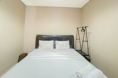 Photo 4 - Cozy And Minimalist Studio Room Ciputra International Apartment