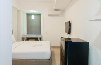 Foto 3 - Cozy Studio At Barsa City Apartment