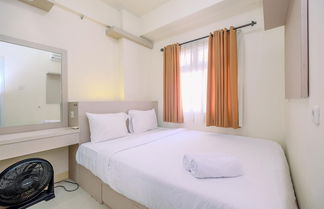 Photo 1 - Comfort Designed 2Br At Green Pramuka City Apartment