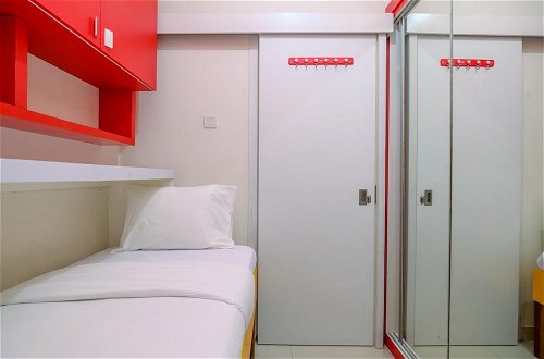 Photo 5 - Comfort Designed 2Br At Green Pramuka City Apartment