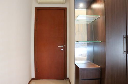 Photo 3 - Full Furnished With Comfort Design 2Br Apartment At Thamrin Residence