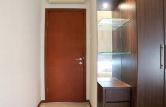 Photo 3 - Full Furnished With Comfort Design 2Br Apartment At Thamrin Residence