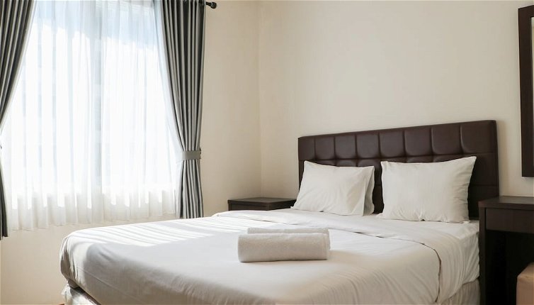 Photo 1 - Full Furnished With Comfort Design 2Br Apartment At Thamrin Residence