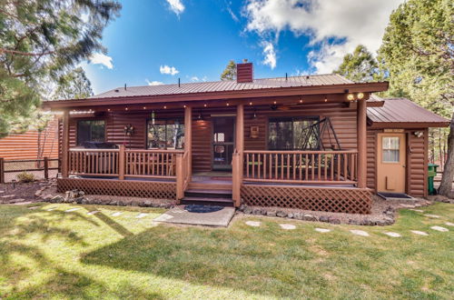 Photo 1 - Cozy Show Low Cabin w/ Backyard ~ 3 Mi to Lake