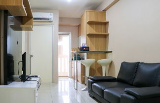 Photo 1 - Cozy Living And Tidy 2Br Green Bay Pluit Apartment