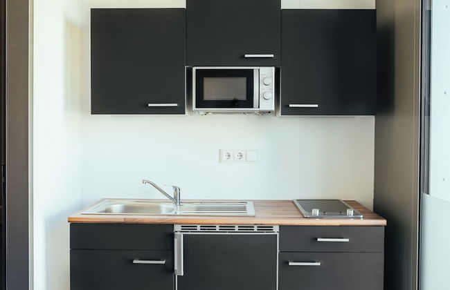 The Rix Studios & Suites - Photo 27