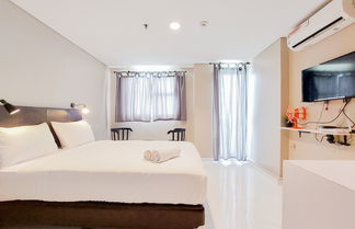 Foto 1 - Modern Look And Comfy Studio At Bintaro Icon Apartment