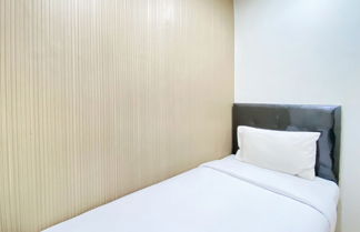 Foto 3 - Minimalist Designed 2Br At Grand Asia Afrika Apartment