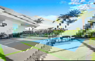 Foto 3 - Sleeps 18 With Pool, Firepit, Pickleball, Putting Green Bravo Villa 9 by Avantstay