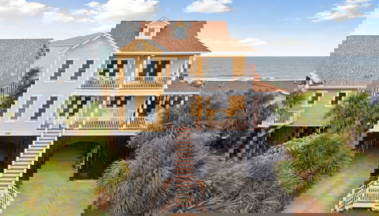 Photo 1 - Oceanfront w Pool Panoramic Deck Views 5bdr Folly Ocean Breeze by Avantstay