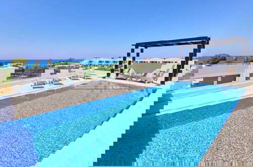 Photo 25 - Beach Sand Villas - Beachfront Rooftop Pool