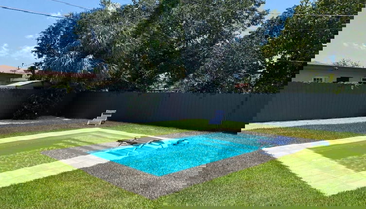 Photo 1 - Boho Chic: 3BR Home With Pool